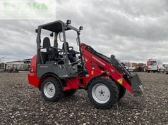 2011 Weidemann 1160 CC30 mini excavator, side view