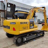 2019 Komatsu PC130 crawler excavator, rear three-quarter view 2019 Komatsu PC130 crawler excavator, rear three-quarter view