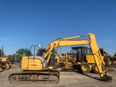 2006 New Holland E135SR crawler excavator side view