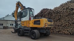 2015 Liebherr LH35 M material handler, rear three-quarter view