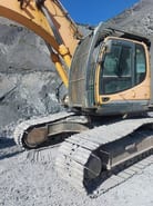 2013 Hyundai RJ80LC-9A excavator, side view of cab and tracks
