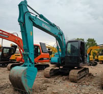 Kobelco SK140-8 crawler excavator, front three-quarter view