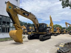 2023 Caterpillar 336D2 crawler excavator, front three-quarter view