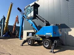 2018 Fuchs MHL320F material handler, rear three-quarter view