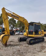 2019 Komatsu PC130 crawler excavator, side view 2019 Komatsu PC130 crawler excavator, side view