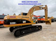 2023 Caterpillar 320CL crawler excavator, rear three-quarter view 2023 Caterpillar 320CL crawler excavator, rear three-quarter view