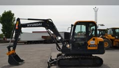 2021 Hyundai HX55 mini excavator, side view