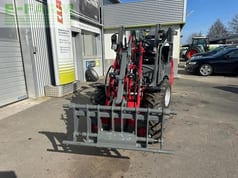 2022 Weidemann 1160 mini excavator, front view with fork attachment