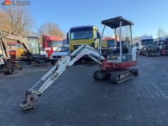 2009 Takeuchi TB014 mini excavator, side view