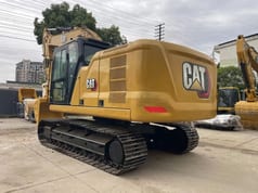 2022 Caterpillar 320GC crawler excavator, rear three-quarter view