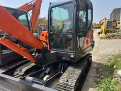 2023 Doosan DX60-9C crawler excavator, front three-quarter view
