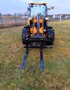 2024 JCB 407 SV wheel loader, front view with pallet forks