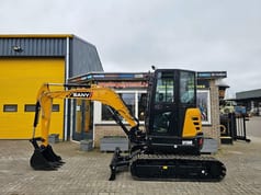 2025 Sany SY35U WE1655 Mini Excavator with yellow body, showing the boom and arm extended to the left with a digging bucket. 2025 Sany SY35U WE1655 Mini Excavator with yellow body, showing the boom and arm extended to the left with a digging bucket.