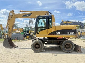 2004 Caterpillar M315C Wiellader Graafmachine