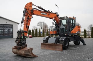 Escavatore gommato Doosan DX140W 2019