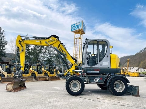 2017 Wacker Neuson EW100 wheel excavator side view