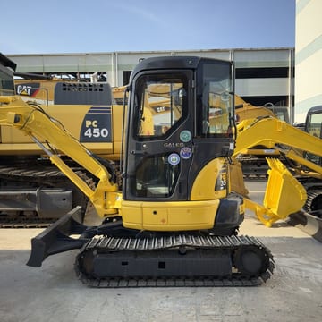 Komatsu PC35MR-2 mini excavator, side view