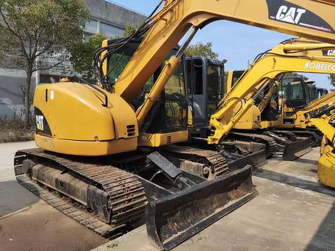 2011 Caterpillar 308C mini excavator, rear three-quarter view