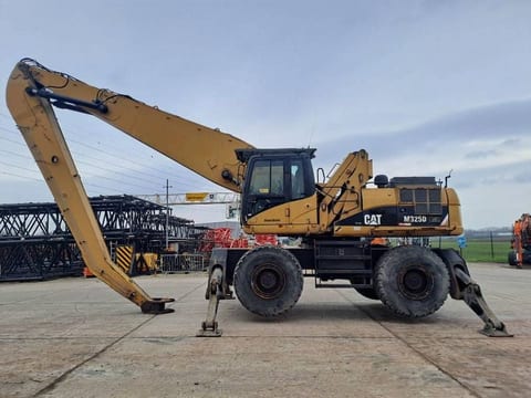 2009 Caterpillar M325D LMH material handler, side profile view