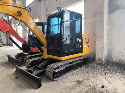 Caterpillar 307E2 mini excavator, side view