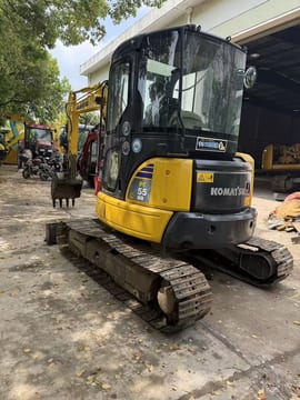 2012 Komatsu PC-55MR mini excavator, rear three-quarter view 2012 Komatsu PC-55MR mini excavator, rear three-quarter view