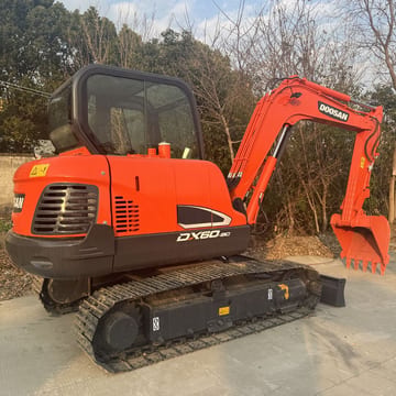 2023 Doosan DX60-9C mini excavator, rear three-quarter view