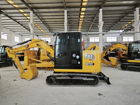 Caterpillar 307E2 mini excavator side view