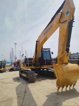 2023 Caterpillar 320D2 mini excavator, front three-quarter view
