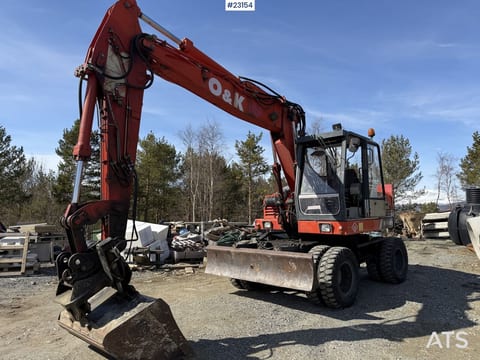 1997 O&K MH CITY wheeled excavator, front three-quarter view 1997 O&K MH CITY wheeled excavator, front three-quarter view