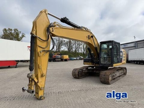 2012 Caterpillar 320E crawler excavator, side profile view
