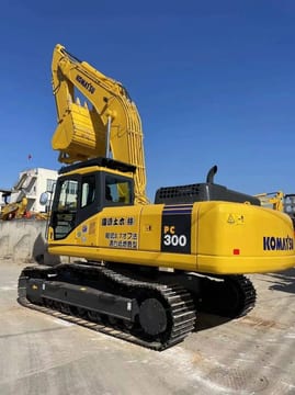 2023 Komatsu PC300-7 crawler excavator, rear three-quarter view