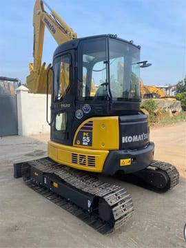 2022 Komatsu PC-55MR mini excavator, front three-quarter view 2022 Komatsu PC-55MR mini excavator, front three-quarter view