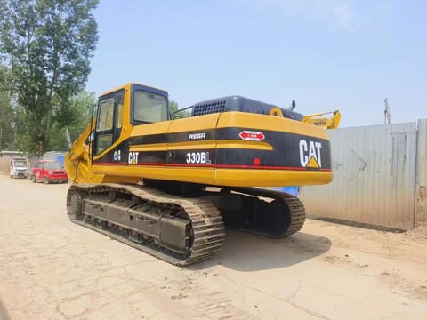 Caterpillar 330BL crawler excavator rear three-quarter view
