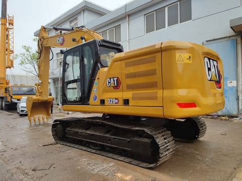 Caterpillar 320GC crawler excavator, rear three-quarter view