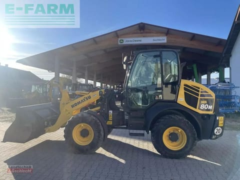 2016 Komatsu WA80M-7 wheel loader, side view 2016 Komatsu WA80M-7 wheel loader, side view