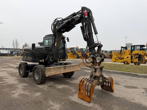 2023 Yanmar B95W excavator, front three-quarter view