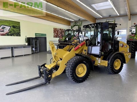 2024 Caterpillar 906-14A wheel loader with pallet forks, front three-quarter view 2024 Caterpillar 906-14A wheel loader with pallet forks, front three-quarter view
