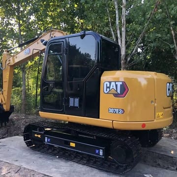 2020 Caterpillar 307E2 crawler excavator, rear three-quarter view