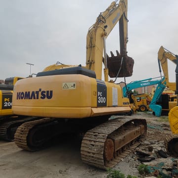 2022 Komatsu PC300-7 crawler excavator, rear three-quarter view