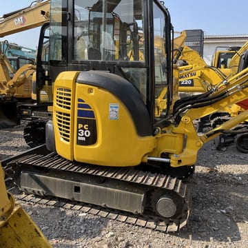 Komatsu PC30MR mini excavator, side view