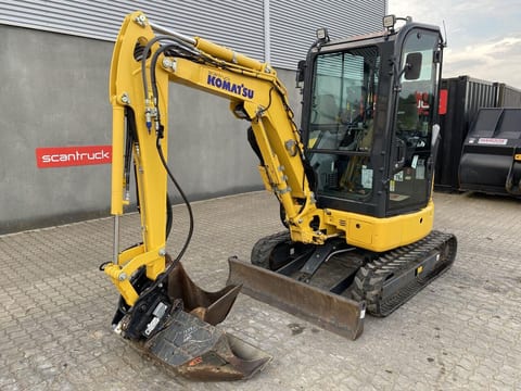 2023 Komatsu PC24MR-5 mini excavator, front three-quarter view