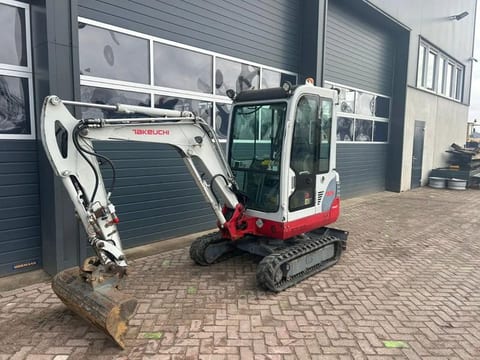 2011 Takeuchi TB219 mini excavator, side view