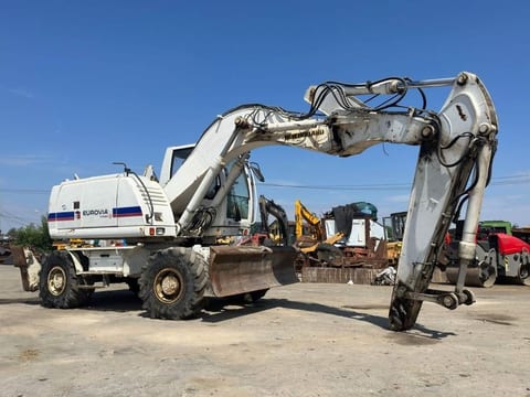 2008 New Holland MH-PLUS wheel excavator, side view