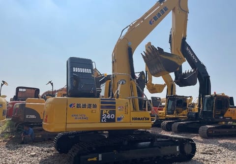 2022 Komatsu PC240LC crawler excavator, rear three-quarter view 2022 Komatsu PC240LC crawler excavator, rear three-quarter view