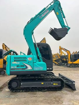 Kobelco SK75 mini excavator, side view