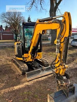 2023 Caterpillar 302.7CR mini excavator, front three-quarter view