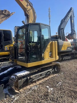 2023 Caterpillar 307.5 mini excavator, side view