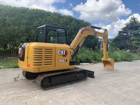 2023 Caterpillar 306E2 crawler excavator, rear three-quarter view