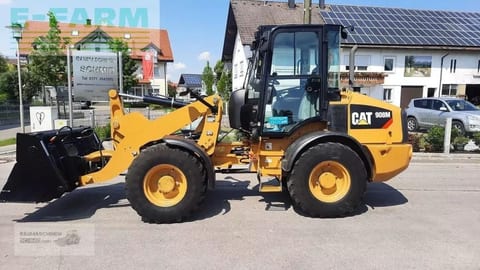2017 Caterpillar 908M wheel loader, side view 2017 Caterpillar 908M wheel loader, side view