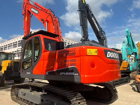 2023 Doosan DX225LCA crawler excavator, rear three-quarter view 2023 Doosan DX225LCA crawler excavator, rear three-quarter view